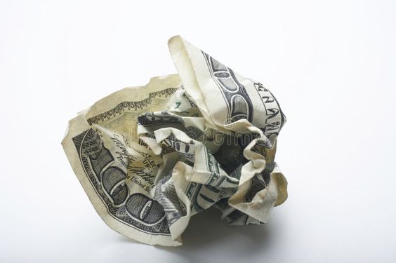 Crumpled $100 bill